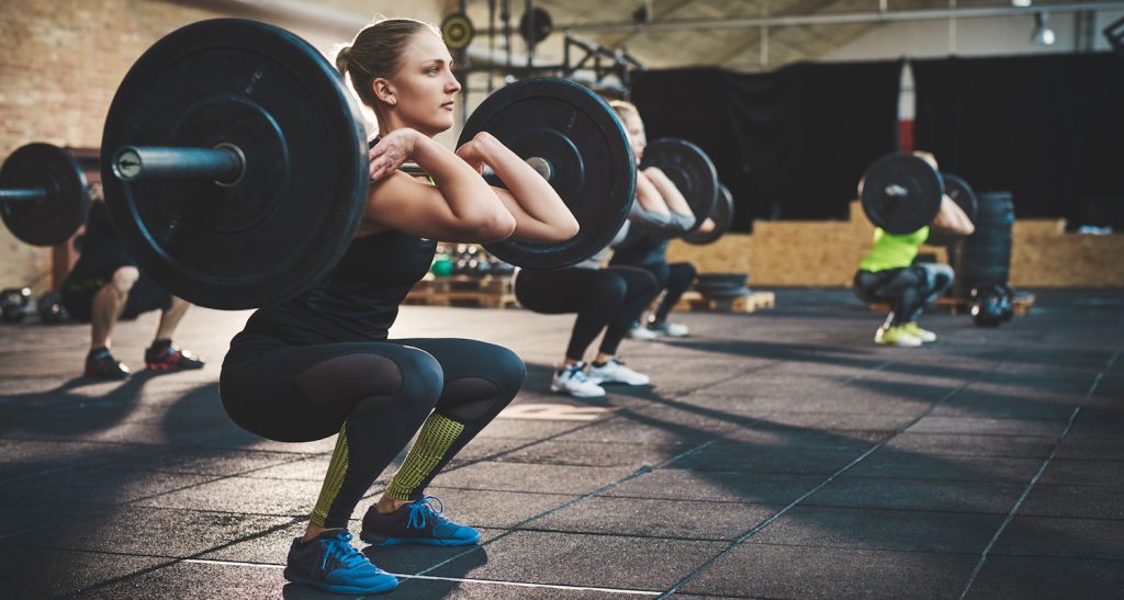 woman workout squat preview 1024x547 - چگونه هنگام استراحت چربی سوزی کنید